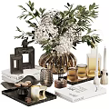 Elegant Decorative Ornament Set With White Floral Bouquet Green Leaves Metallic Vase Candles And Books