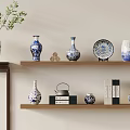 Blue and White Ceramic Wares Display on Wooden Shelves with Vases Plates and Teapot