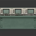 Industrial Control Console With Three Green Displays And Control Panel Buttons