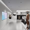 Modern Bright Clothing Store Interior With Mannequins Hanging Clothes And Large Screen