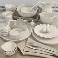 White Ceramic Dinnerware Set Including Bowls Plates Mugs And Egg Holder On Linen Kitchen Table