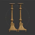 Elegant Pair Of Golden Candlesticks With Carved Base And Ornate Design