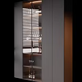 Modern Wine Cabinet With Glass Door And LED Lighting Displaying Wine Bottles And Glasses