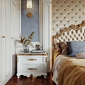 Luxurious Bedroom With Tufted Headboard Gold Accents Nightstand Dried Flowers Gray Wall And White Wardrobe