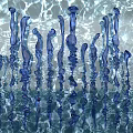 Stunning Blue Icicle Shaped Art Installation With Water Ripple Background
