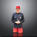 Man In Red Hat Dark Blue Jacket And Red Patterned Shorts Posing With Crossed Hands