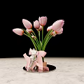 Beautiful Pink Tulips In Bow Decorated Vase On Marble Tabletop