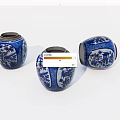 Three Blue and White Ceramic Jars With Intricate Scenic Patterns on White Background