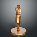 Golden Female Statue Standing On Circular Base With Hand Near Face