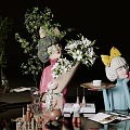 Decorative Ornament Set with Lady Figurines Green Plants Flower Bouquets and Tea Cup on Tabletop
