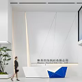 Modern Office Reception Area Design With White And Blue Geometric Counter And Green Plant