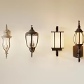Different Designed Wall Sconces With Metal Frames And Glass Shades On White Wall