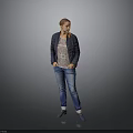 Woman in Dark Jacket and Patterned T-Shirt with Blue Jeans on Gray Background