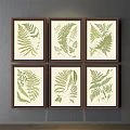 Framed Botanical Prints With Fern Leaves And Various Designs On Gray Wall