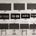 Modern TVs In Various Sizes With Wall And Stand Mounted Digital Time Displays 3d model
