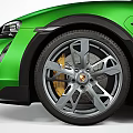Green Porsche Taycan Cross Turismo Sporty Design With Black Roof And Alloy Wheels