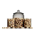 Clear Glass Jars Filled With Cork Stoppers And Scattered Cork Pieces On White Background