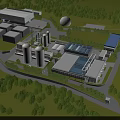 Industrial Factory Complex With Multiple Buildings Large Storage Tanks Green Trees And Roads
