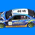 Blue And White Race Car With Goodyear Logos Rear Spoiler Yellow Wheels And Number 10