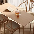 Rustic Wooden Dining Table Set With Woven Seats Open Book And Glass Decanter