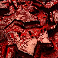 Vibrant Red Rock Crystal Landscape With Irregular Texture Glossy Surface And Layered Fractured Structure