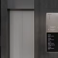 Modern Elevator Hallway With Dark Gray Walls Lighting Signage Glass Doors And Silver Trash Can