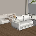 Modern Light Beige Two Seater Sofa With Throw Pillows Blanket And Wooden Floor