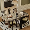 Elegant Dining Table Set with Patterned Tabletop Wooden Chairs and Decorative Vase Books Candles