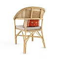 Stylish Natural Rattan Armchair With Red Geometric Cushion And Woven Accents