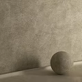 Textured Beige Wall With Decorative Sphere Accent