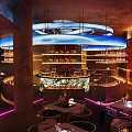 Modern Bar Interior Design With Neon Lights Sofa Seats And Round Tables