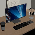 Modern Desktop Computer Setup with Monitor Keyboard Mouse Headphones and Coffee Cup