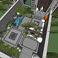 Traditional Garden Landscape With Rockery Water Feature Green Plants And Paved Courtyard
