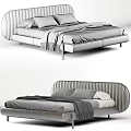 Elegant Modern Double Bed Design With Curved Upholstered Headboard Plush Mattress And Soft Throw Blanket