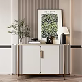 Modern White Console Cabinet Sideboard With Gold Handles Green Plant Artwork Table Lamp And Books