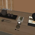 Traditional Tea Set with Teapot Teacups Tea Tray and Charcoal Fire on Wooden Table