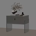 Light Beige Bedside Table With Vertical Slat Door Transparent Legs Stacked Books And White Vase