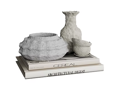 Decorative Ornament Set Featuring Shell Shaped Container Tall Vase and Small Cup on Stacked Books 3d model