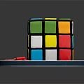 Rubik's Cube Shaped Birthday Cake With Colorful Squares Red Ribbon And Happy Birthday Message