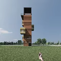 Scenic Observation Tower Standing In Green Grass Field With Trees And Blue Sky