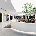 Modern Front Desk Reception Area With Sofa Seating People And Colorful Floor Tiles Near Supermarket