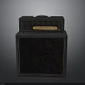 Black Guitar Amplifier With Two Section Design Control Panel And Speaker Cabinet