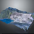 Mountainous Terrain With Rolling Hills Green Vegetation And Blue Water Bodies