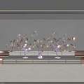 Elegant Decorative Lights Illuminating Stage With Ballerina Sculptures And Wavy Textured Wall