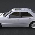 Silver Mercedes Sedan With Sunroof Sleek Body Design And Shiny Wheels