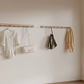 Wooden Hook Racks On Wall With Hanging Clothes And Stylish Bags