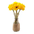 Yellow Flower Bouquet In Clear Glass Vase With Jute Wrapped Bottom For Home Decoration