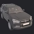 Dark Toyota SUV With Roof Rack Alloy Wheels And Modern Design