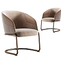 Two Modern Leisure Chairs With Beige Fabric Upholstery And Curved Metal Frame Design