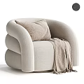 Cozy Beige Upholstered Lounge Chair with Soft Pillow and Knitted Blanket in Modern Rounded Design